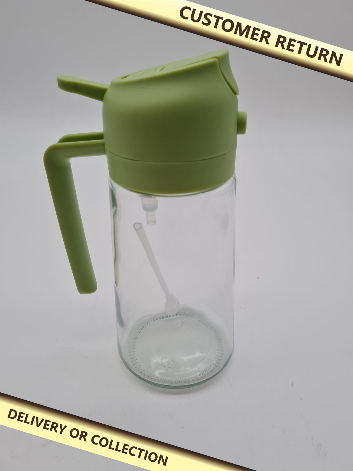 2-in-1 Cooking Oil Dispenser and Sprayer Bottle — photograph 1 — Customer return; auction delivery information shown on image