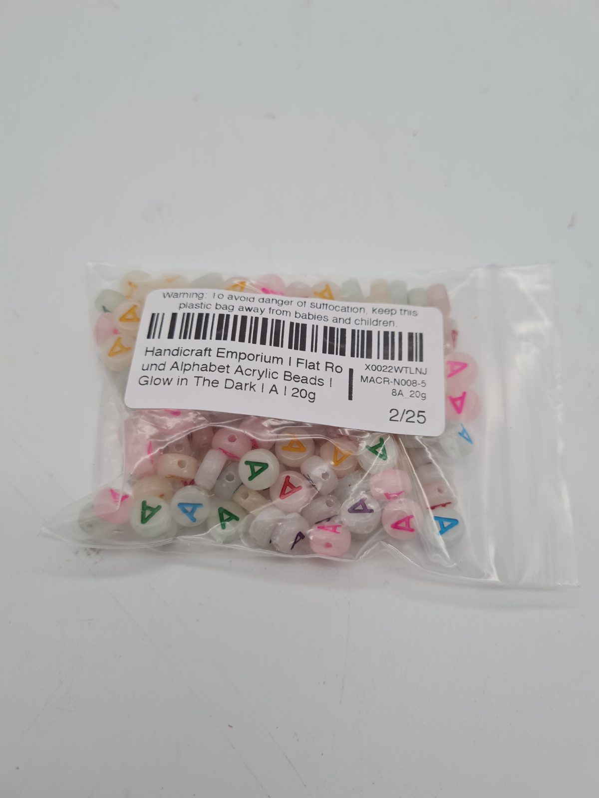 Flat Round Letter A Acrylic Beads — photograph 3