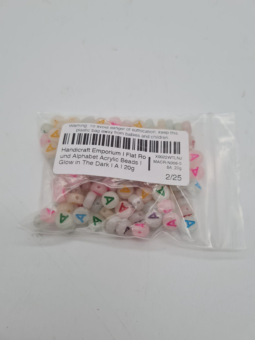 Flat Round Letter A Acrylic Beads — photograph 3