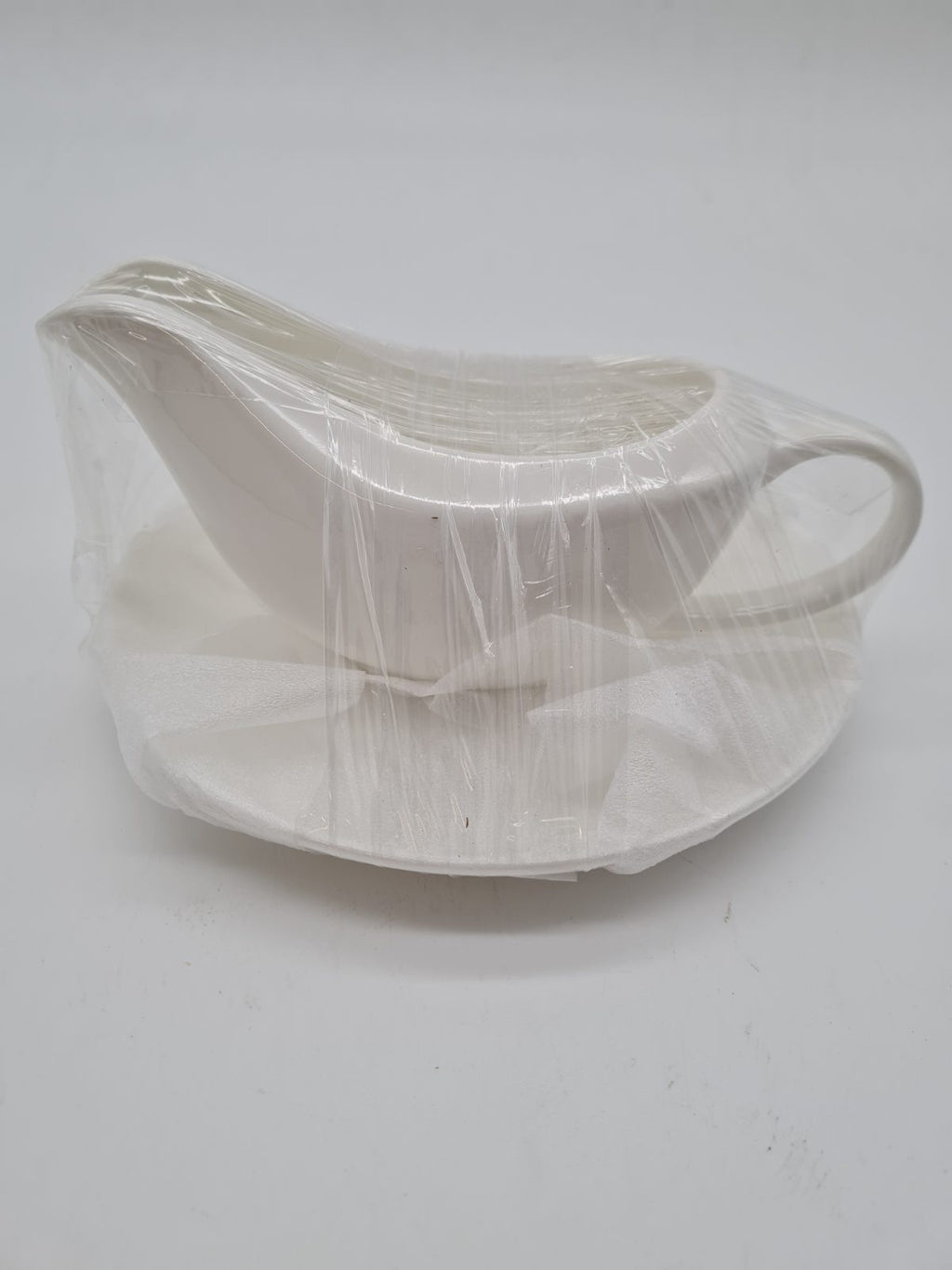 Ceramic Gravy Boat and Saucer Set — photograph 1
