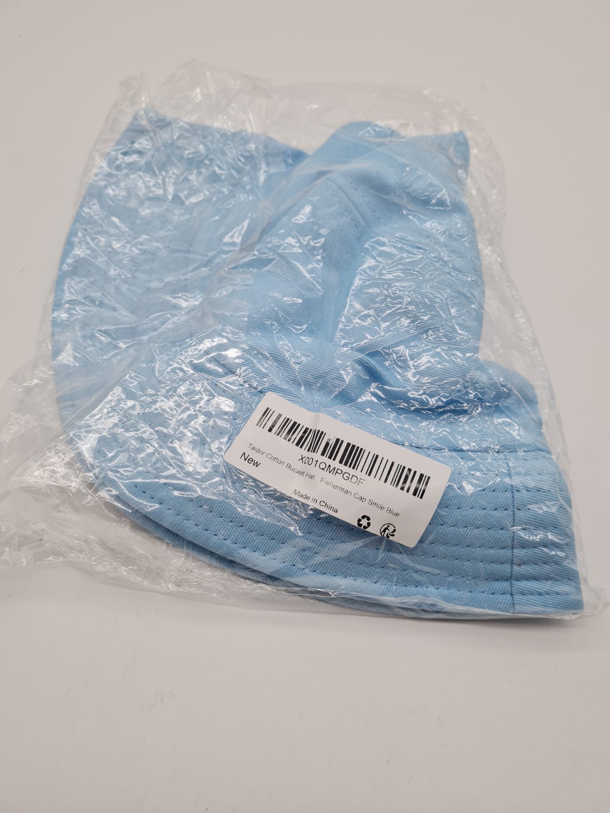 Blue Bucket Hat with Smiley Face Patch — photograph 3