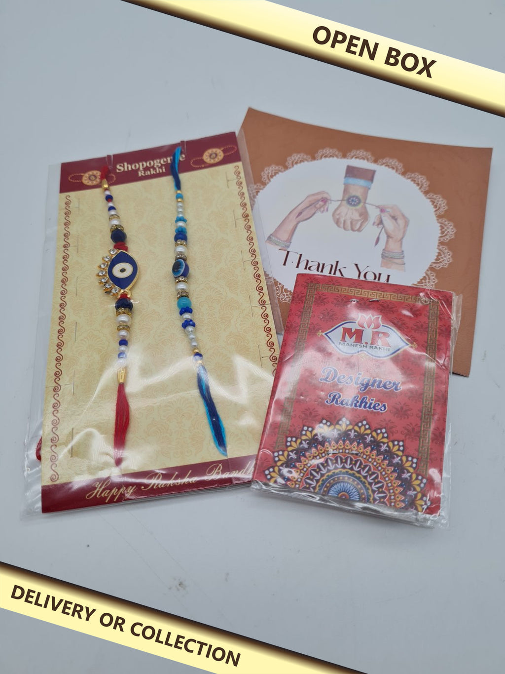 Two Rakhi Wrist Threads Set — photograph 1 — Open box; auction delivery information shown on image