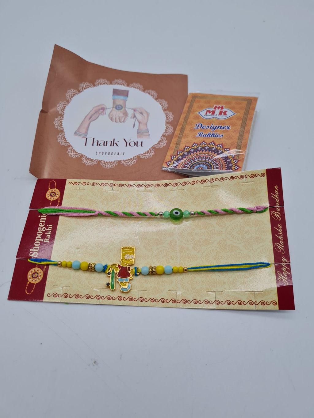 Set of 2 Rakhi Bracelets featuring Bart simspon — photograph 1