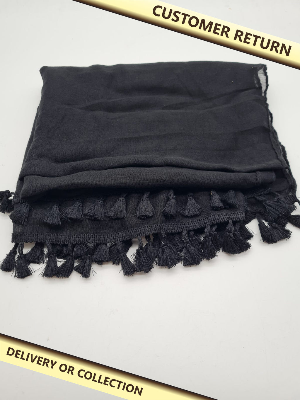 Tasselled Mesh Sarong Cover-Up — photograph 1 — Customer return; auction delivery information shown on image