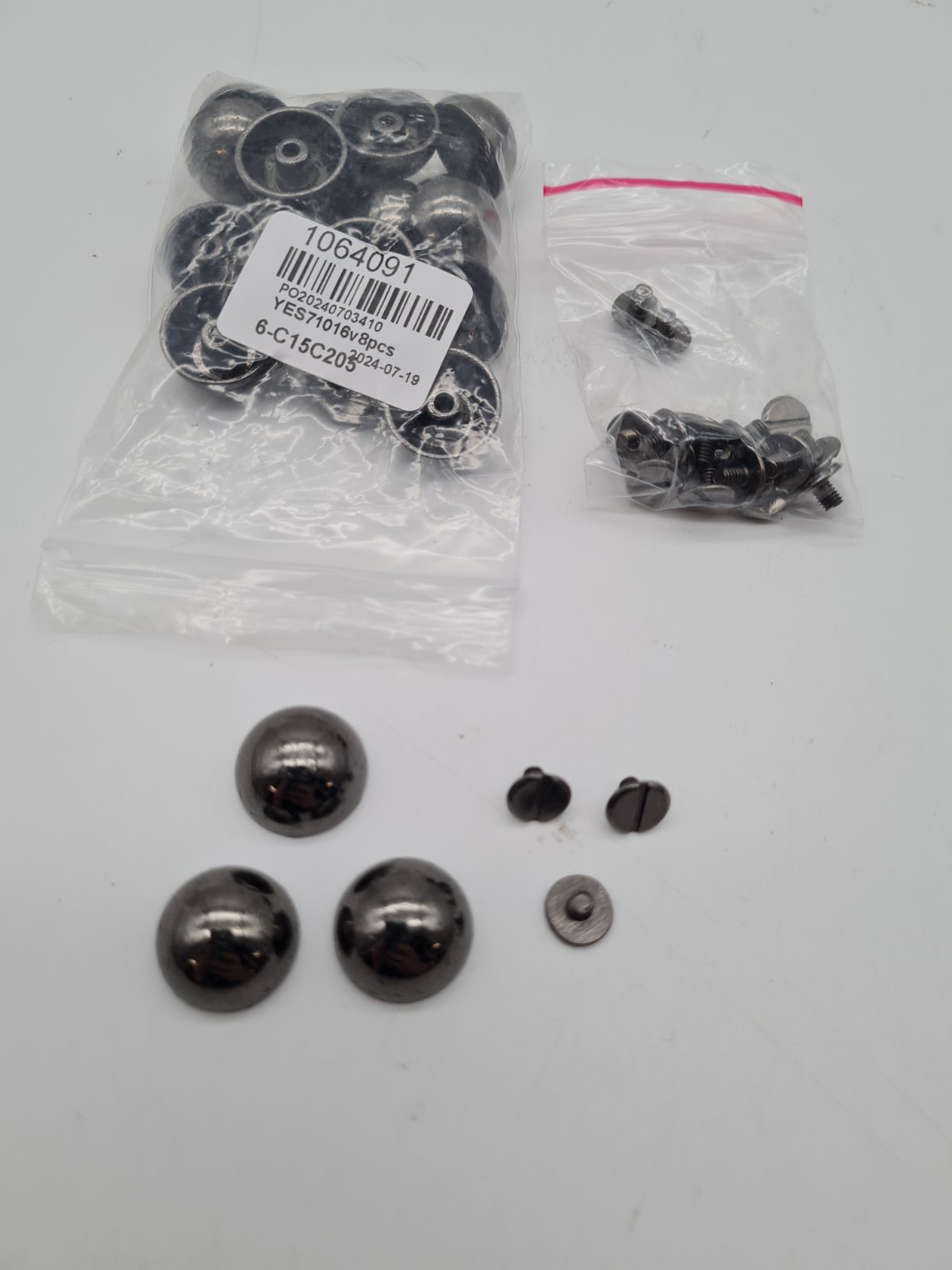 Screw-On Domed Bag Feet Studs — photograph 1