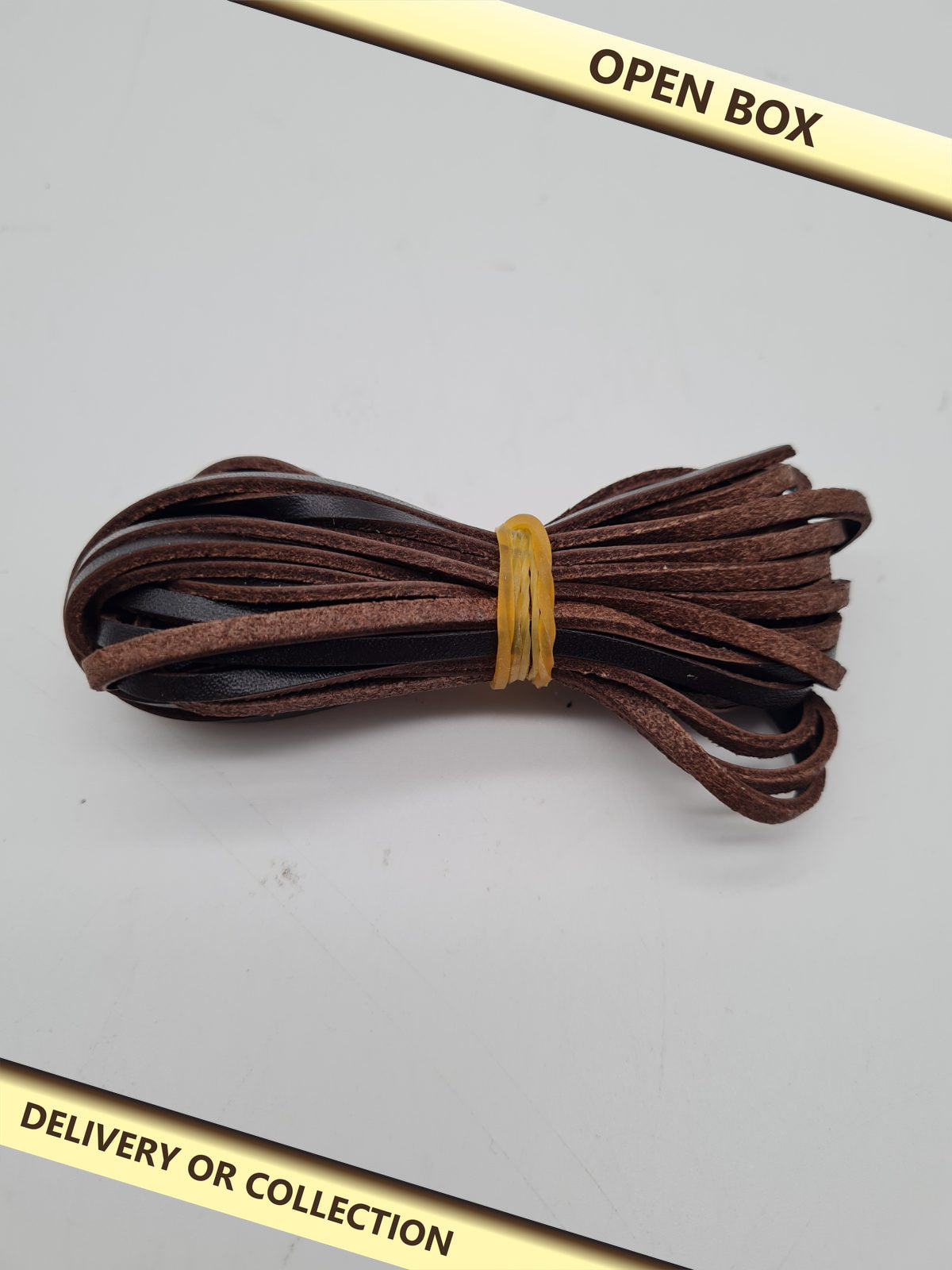 Flat Leather Lacing Cord — photograph 1 — Open box; auction delivery information shown on image
