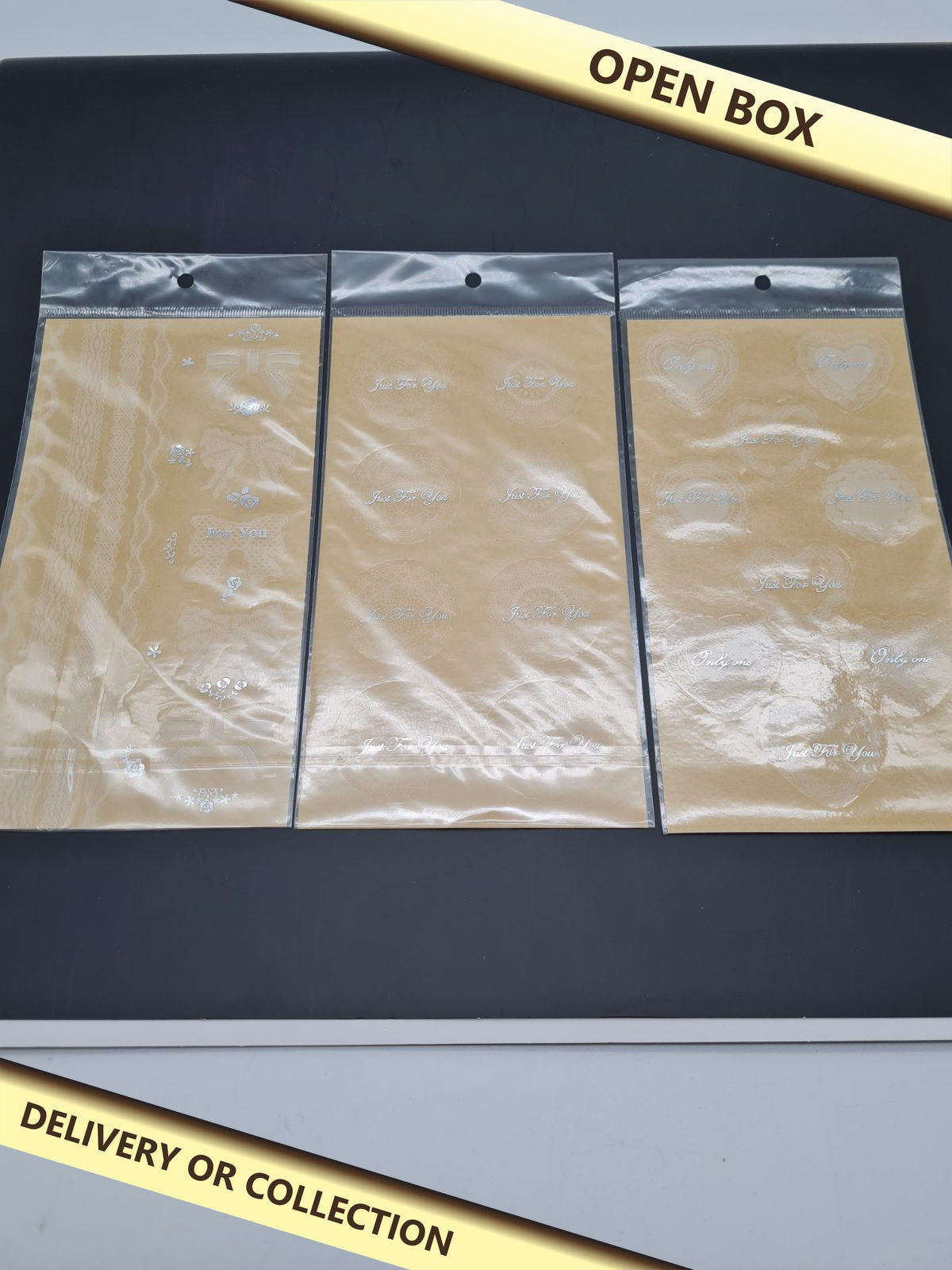 Decorative gift and craft stickers, 3 sheets — photograph 1 — Open box; auction delivery information shown on image