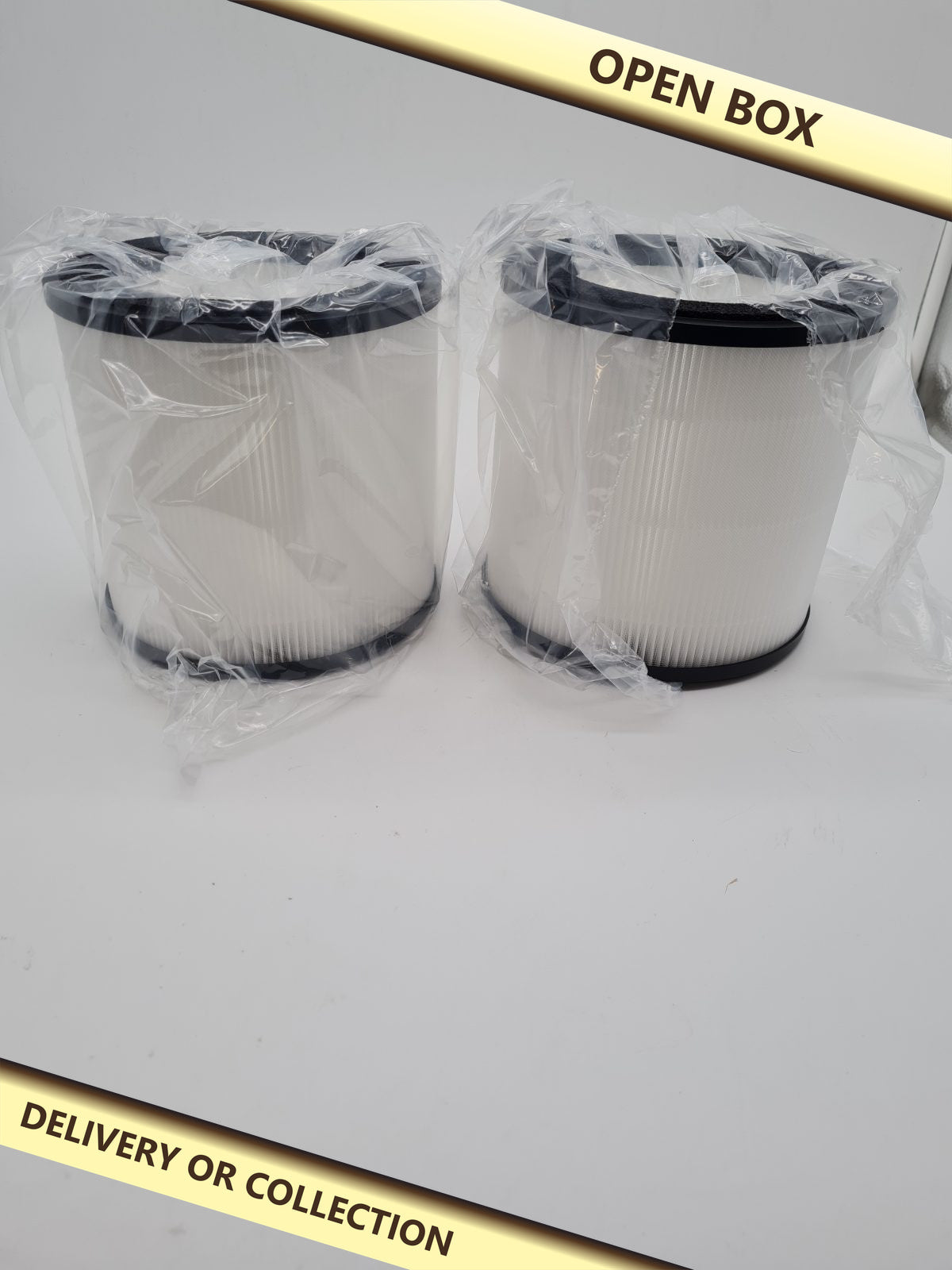 Cylindrical Air Purifier Replacement Filters - Pack of 2 — photograph 1 — Open box; auction delivery information shown on image
