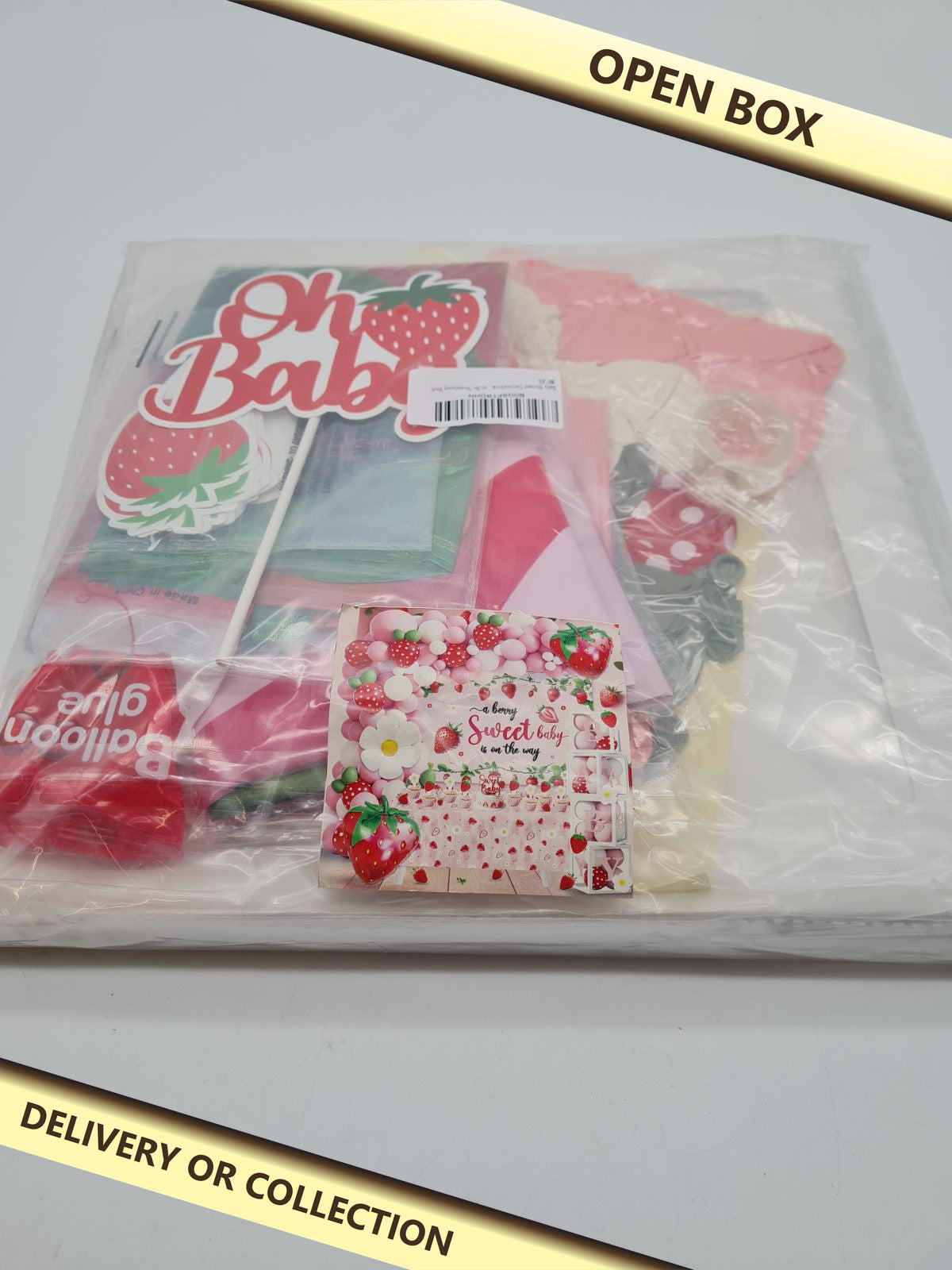 Strawberry-Themed Baby Shower Decoration Set — photograph 1 — Open box; auction delivery information shown on image
