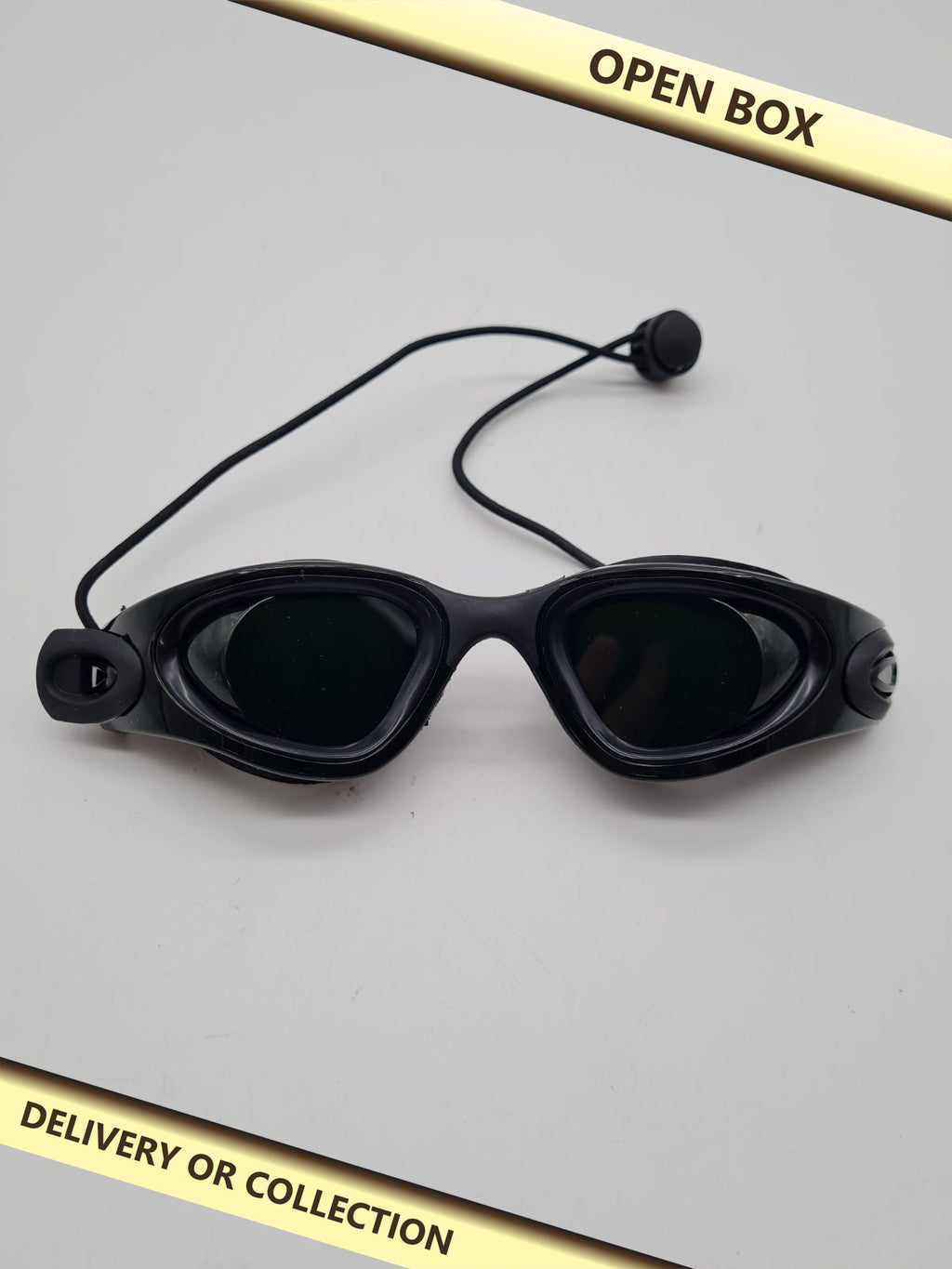 Tanning Goggles — photograph 1 — Open box; auction delivery information shown on image
