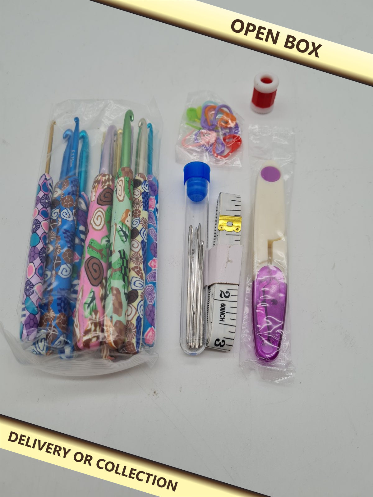 Crochet Hook and Accessories Set — photograph 1 — Open box; auction delivery information shown on image