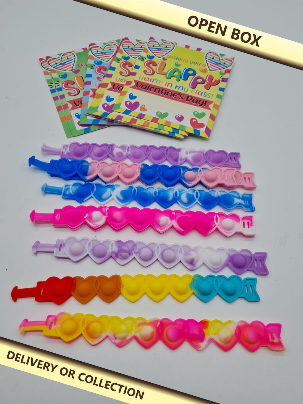 Heart Pop Fidget Bracelets with Valentine's Cards Set — photograph 1 — Open box; auction delivery information shown on image