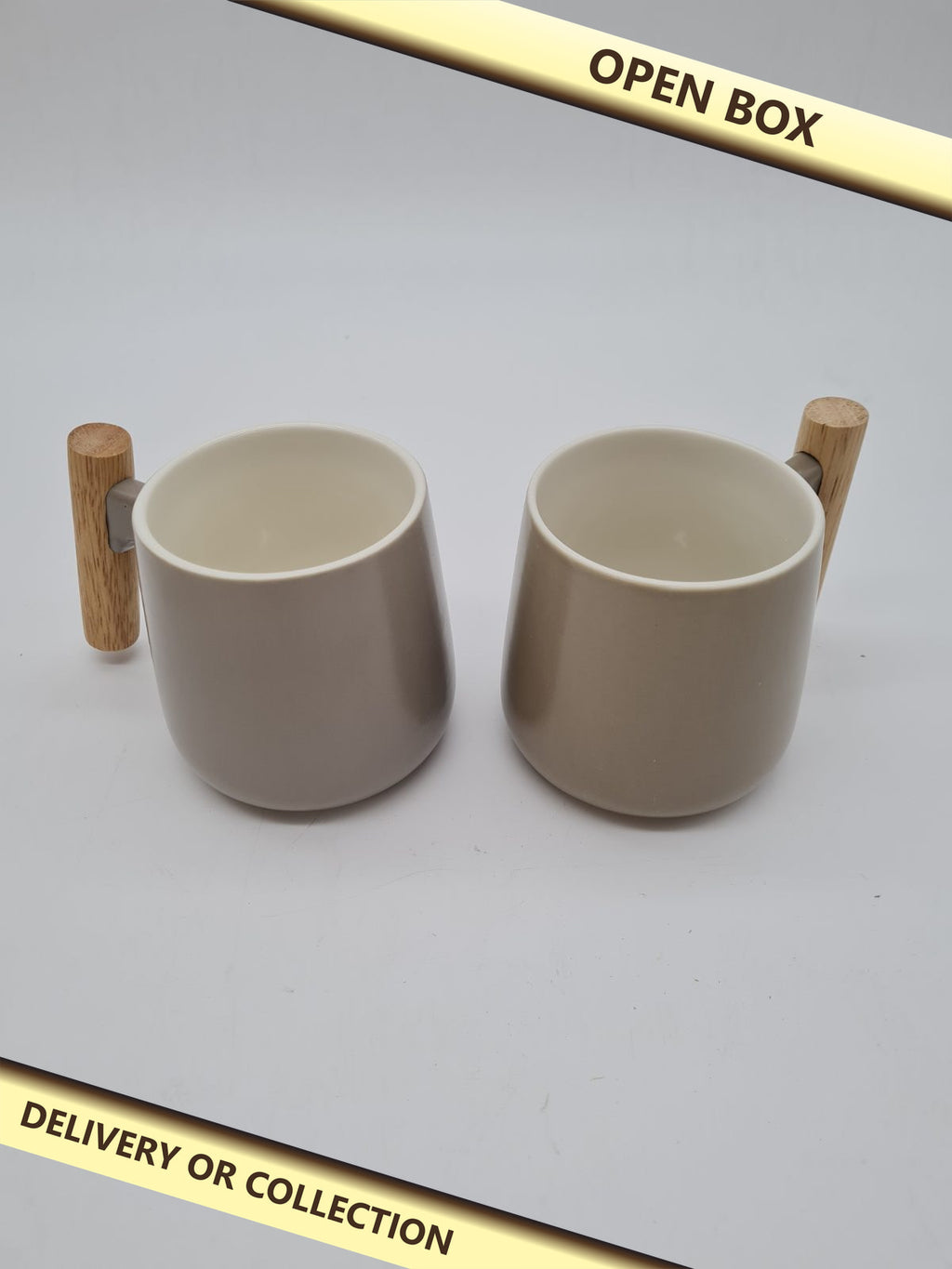 Pair of Ceramic Mugs with Wooden Handles — photograph 1 — Open box; auction delivery information shown on image
