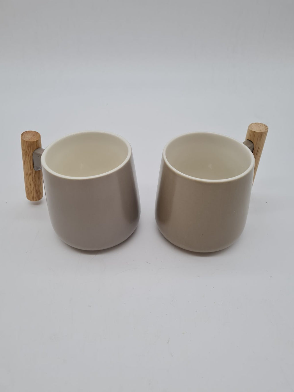 Pair of Ceramic Mugs with Wooden Handles — photograph 1