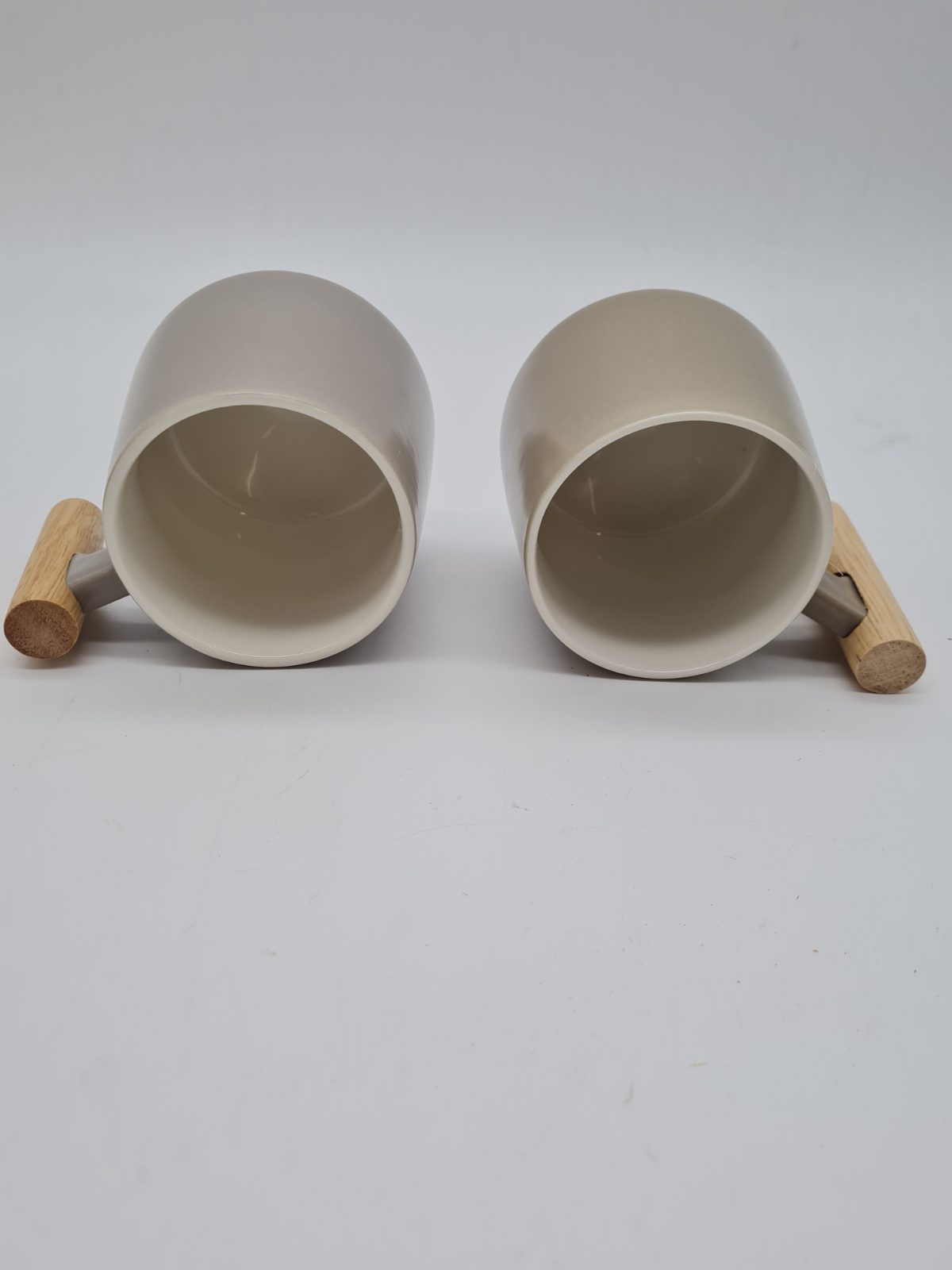 Pair of Ceramic Mugs with Wooden Handles — photograph 2