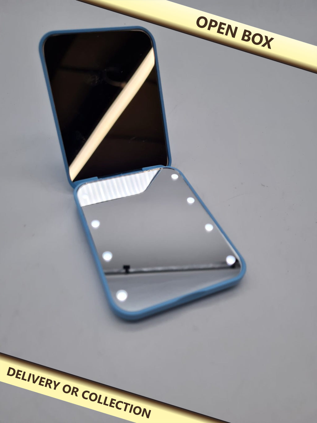 LED blue Lighted Compact Mirror MR-L2307 — photograph 1 — Open box; auction delivery information shown on image