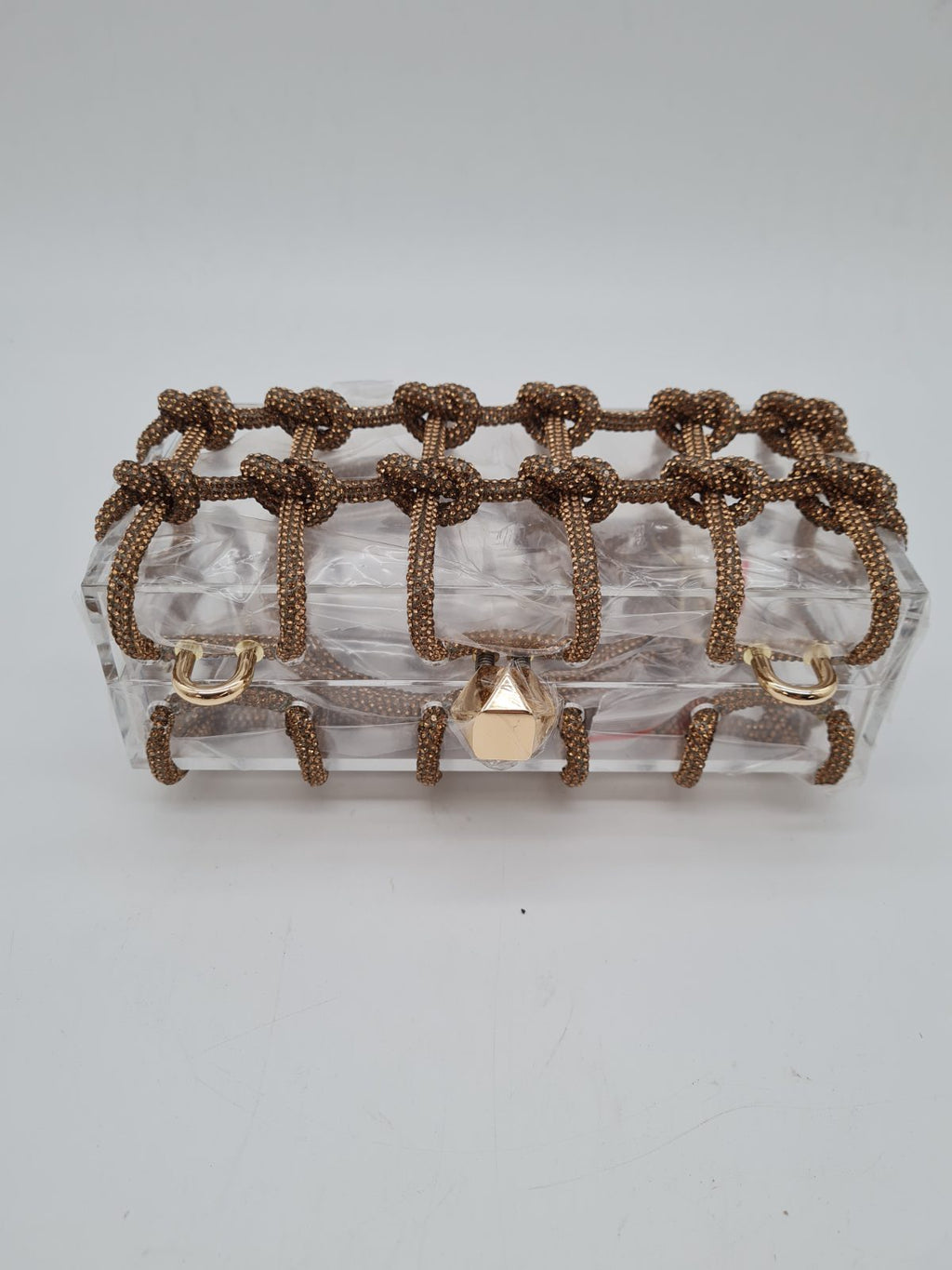 Rhinestone Knot Cage Acrylic Clutch Bag — photograph 1