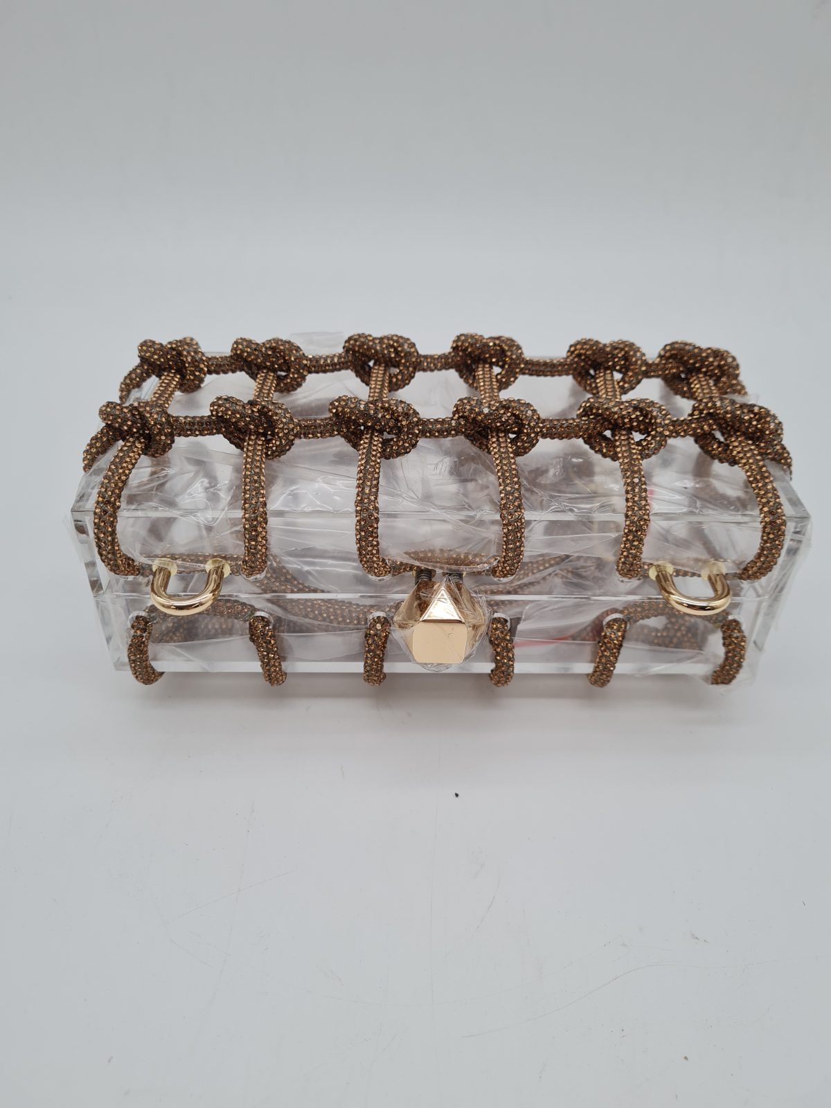 Rhinestone Knot Cage Acrylic Clutch Bag â€” photograph 1