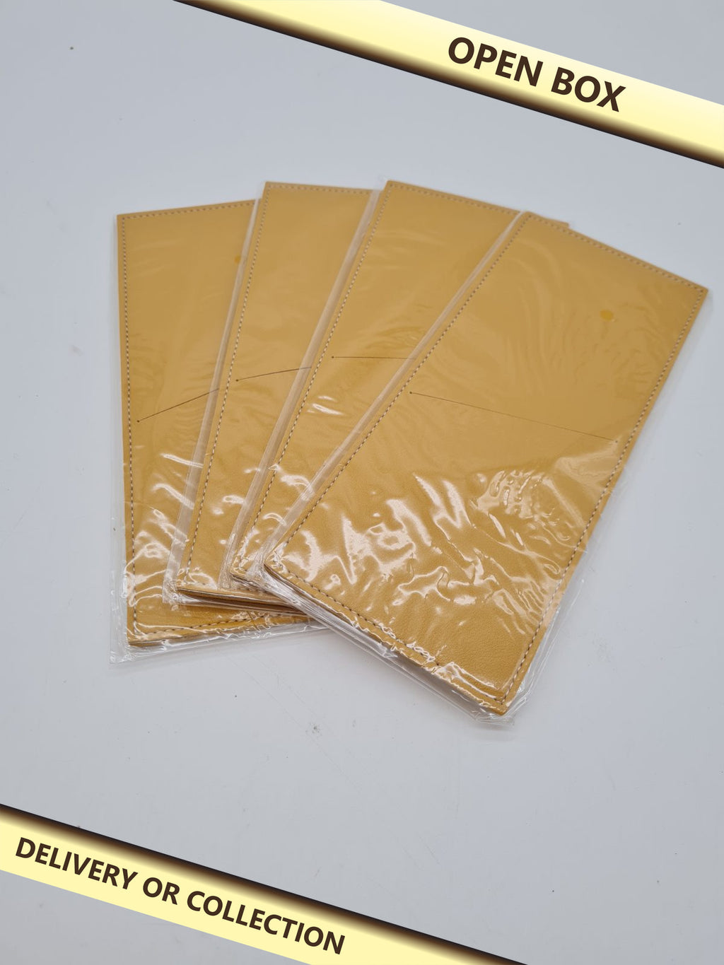 Set of 4 leather yellow Cutlery Sleeves — photograph 1 — Open box; auction delivery information shown on image