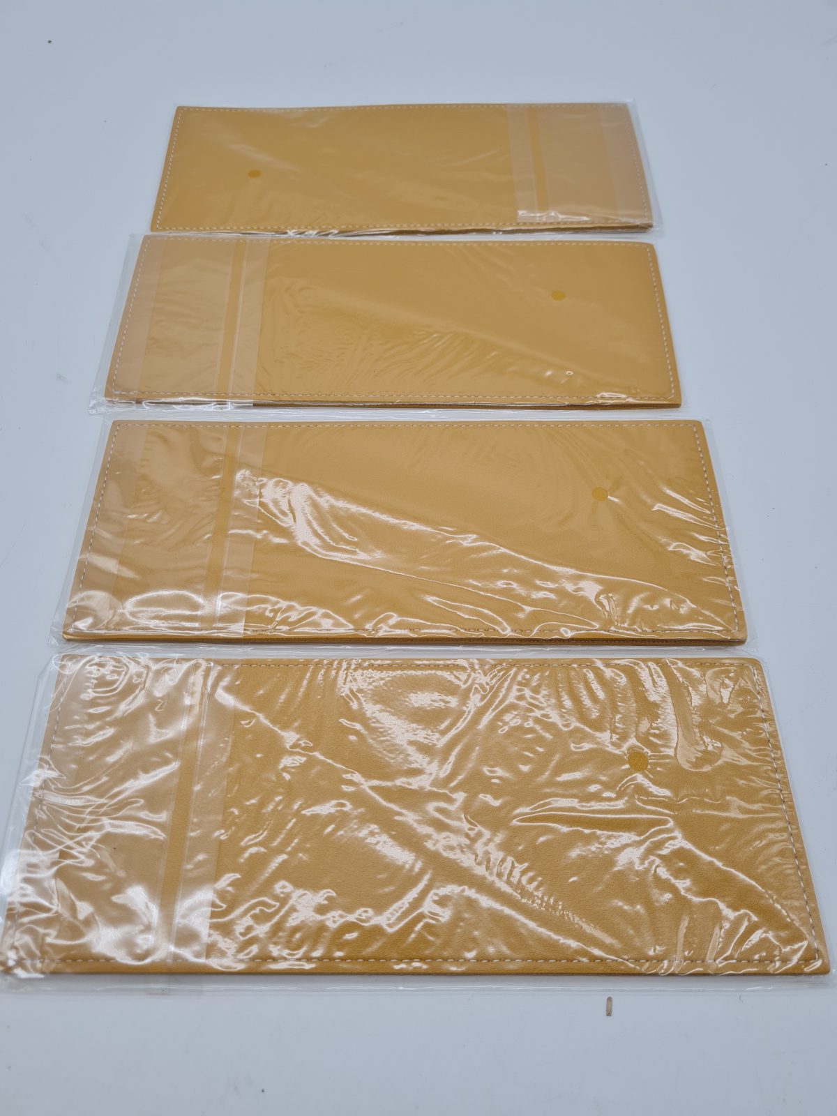 Set of 4 leather yellow Cutlery Sleeves — photograph 2