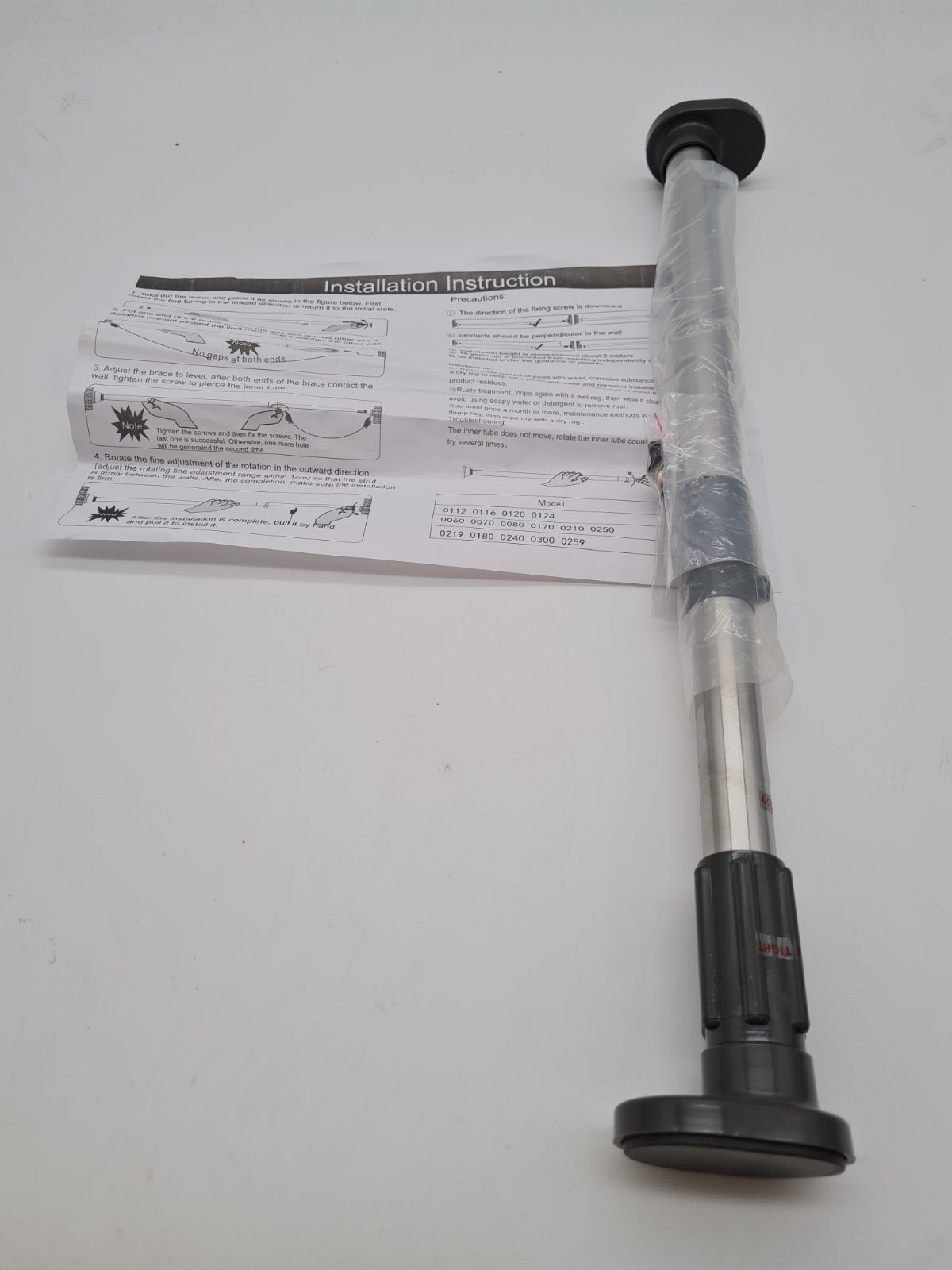 Adjustable Telescopic Tension Rod — photograph 1