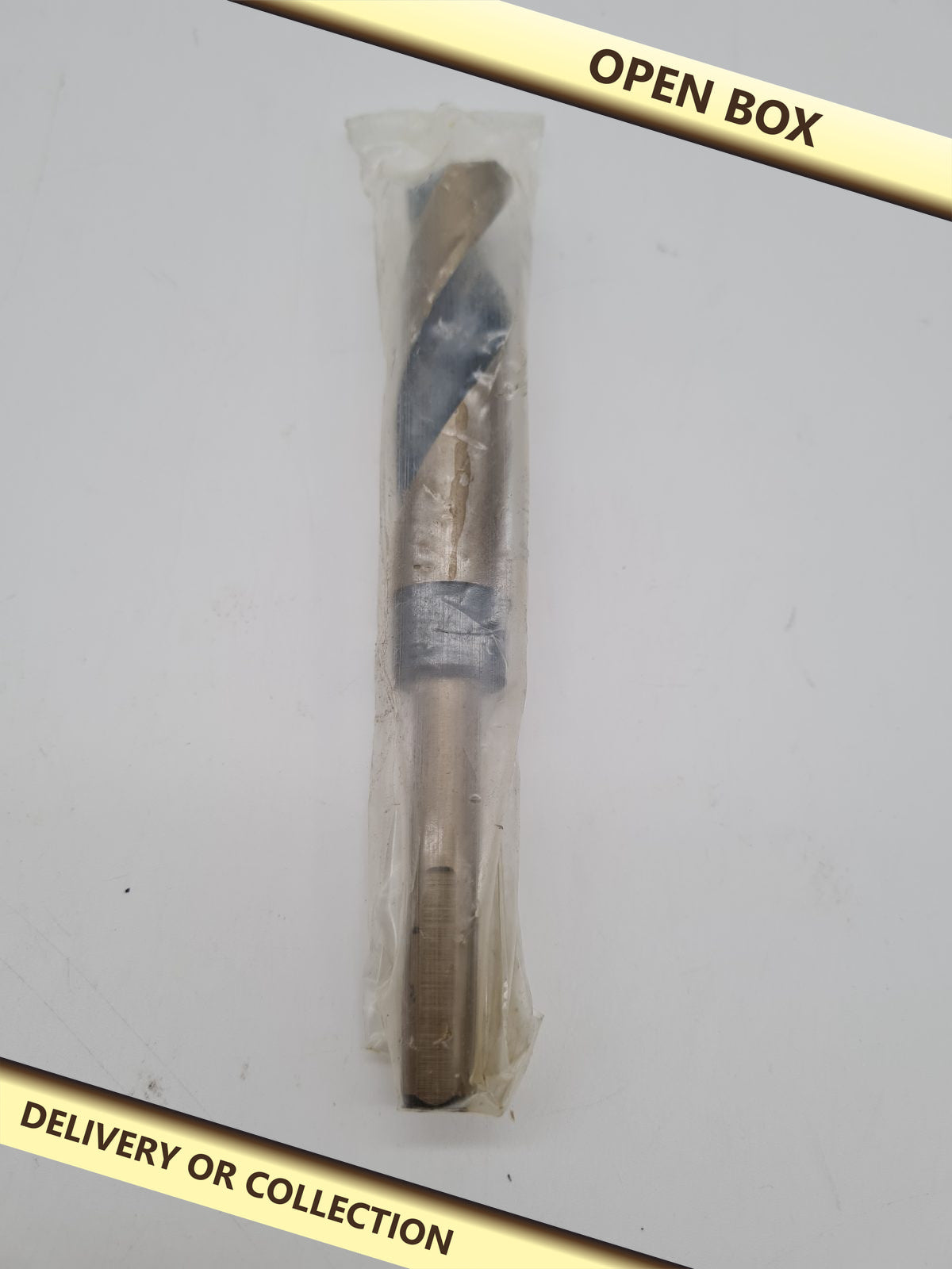 Reduced-Shank Twist Drill Bit — photograph 1 — Open box; auction delivery information shown on image