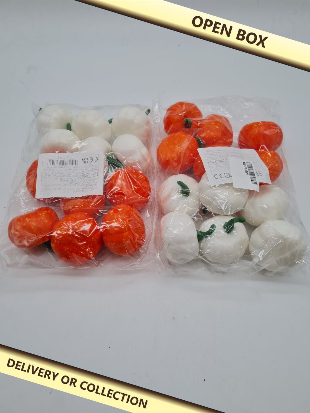 Assorted Artificial Decorative Pumpkins — photograph 1 — Open box; auction delivery information shown on image