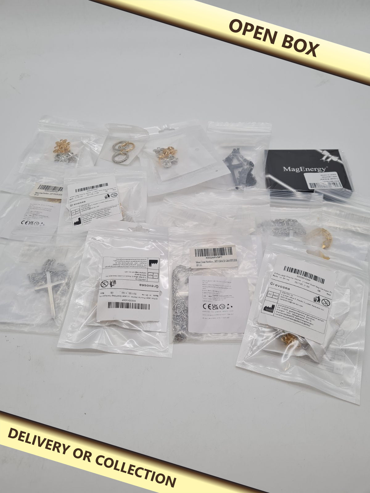 Mixed jewellery bundle — photograph 1 — Open box; auction delivery information shown on image