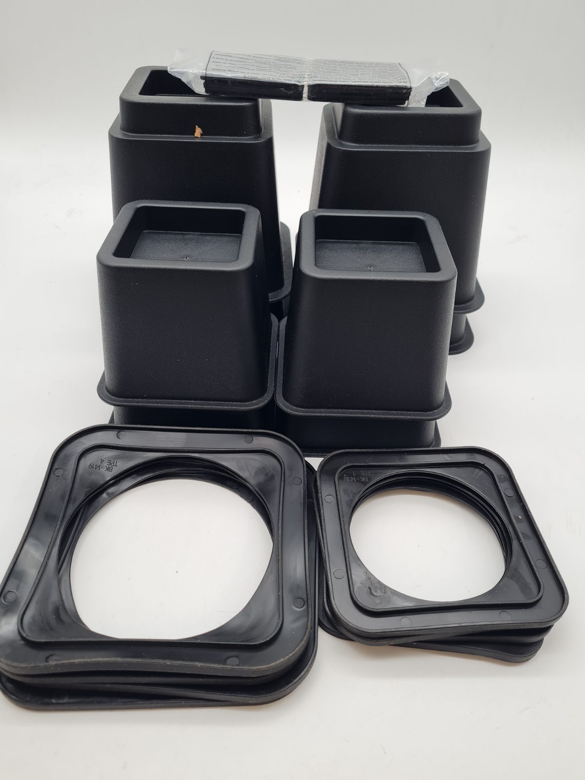 Adjustable Furniture Risers Set of 8 — photograph 1