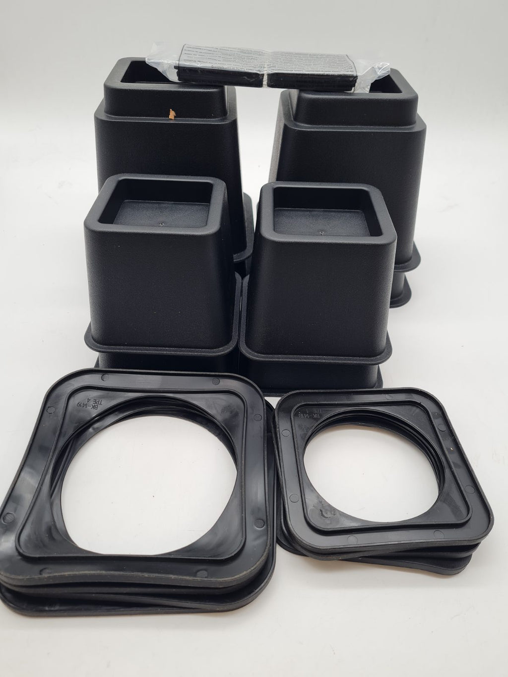 Adjustable Furniture Risers Set of 8 — photograph 1