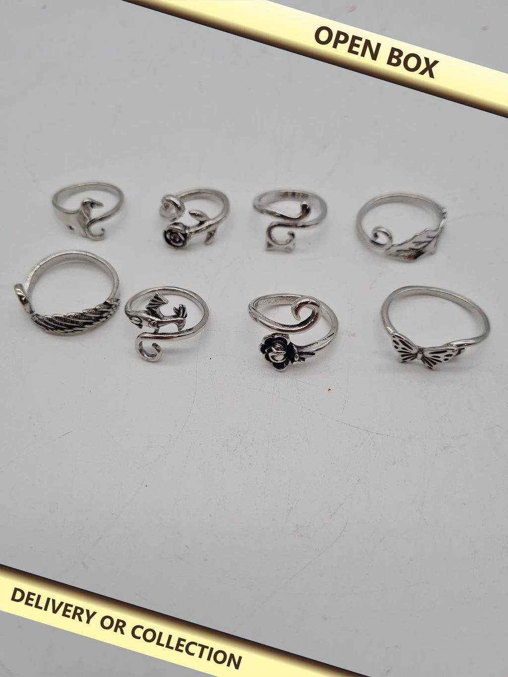 5 packs of 8-Piece Adjustable Crochet Tension Ring Set — photograph 1 — Open box; auction delivery information shown on image
