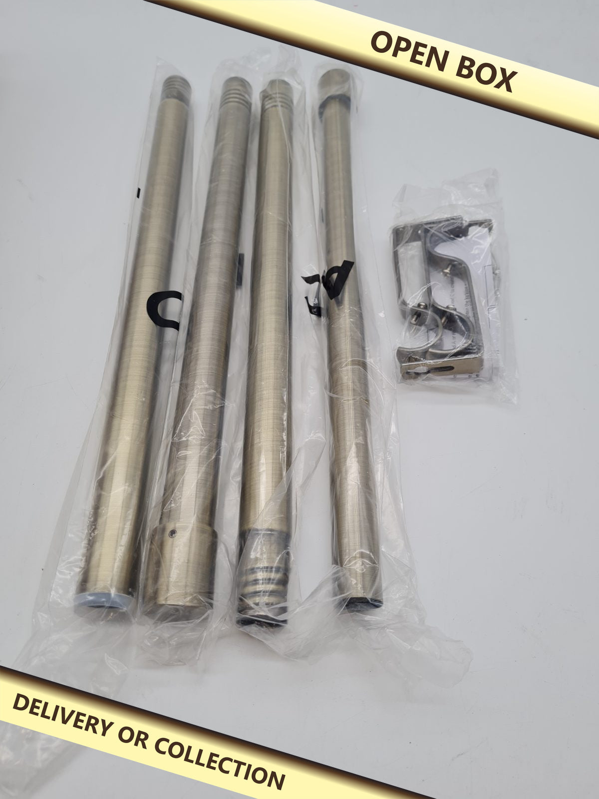 Curtain Pole Set with Mounting Brackets — photograph 1 — Open box; auction delivery information shown on image