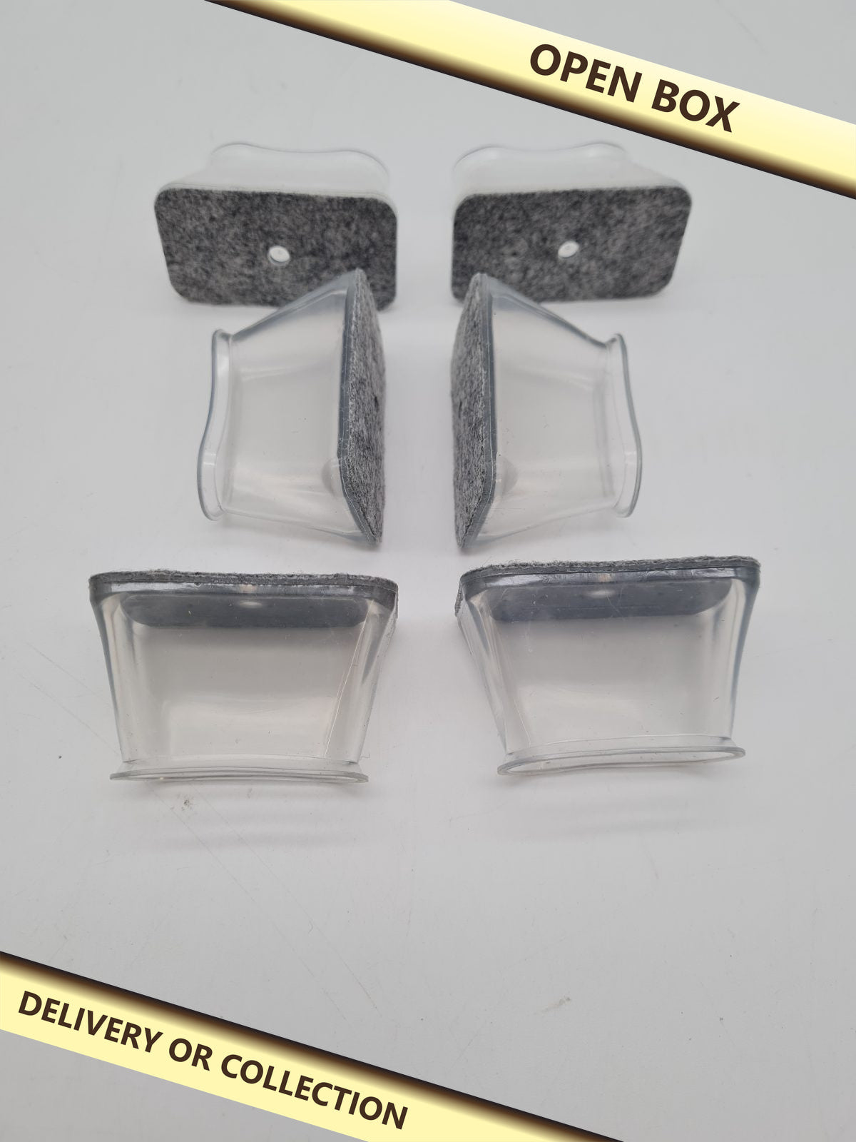 Furniture Leg Protectors 24 pack — photograph 1 — Open box; auction delivery information shown on image