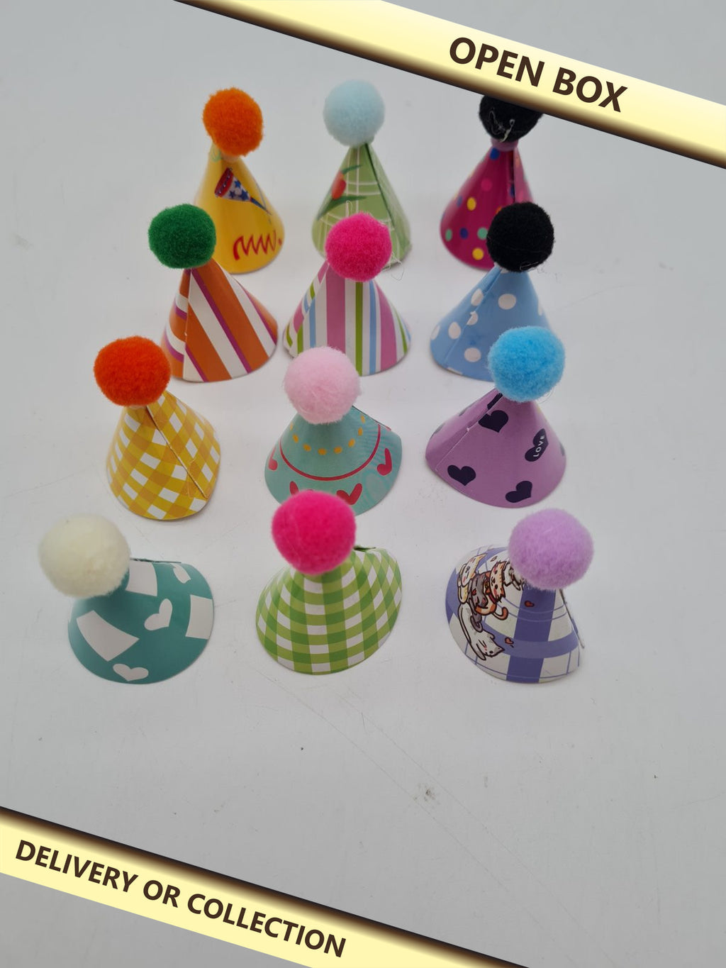 Set of miniature party hat decorations — photograph 1 — Open box; auction delivery information shown on image
