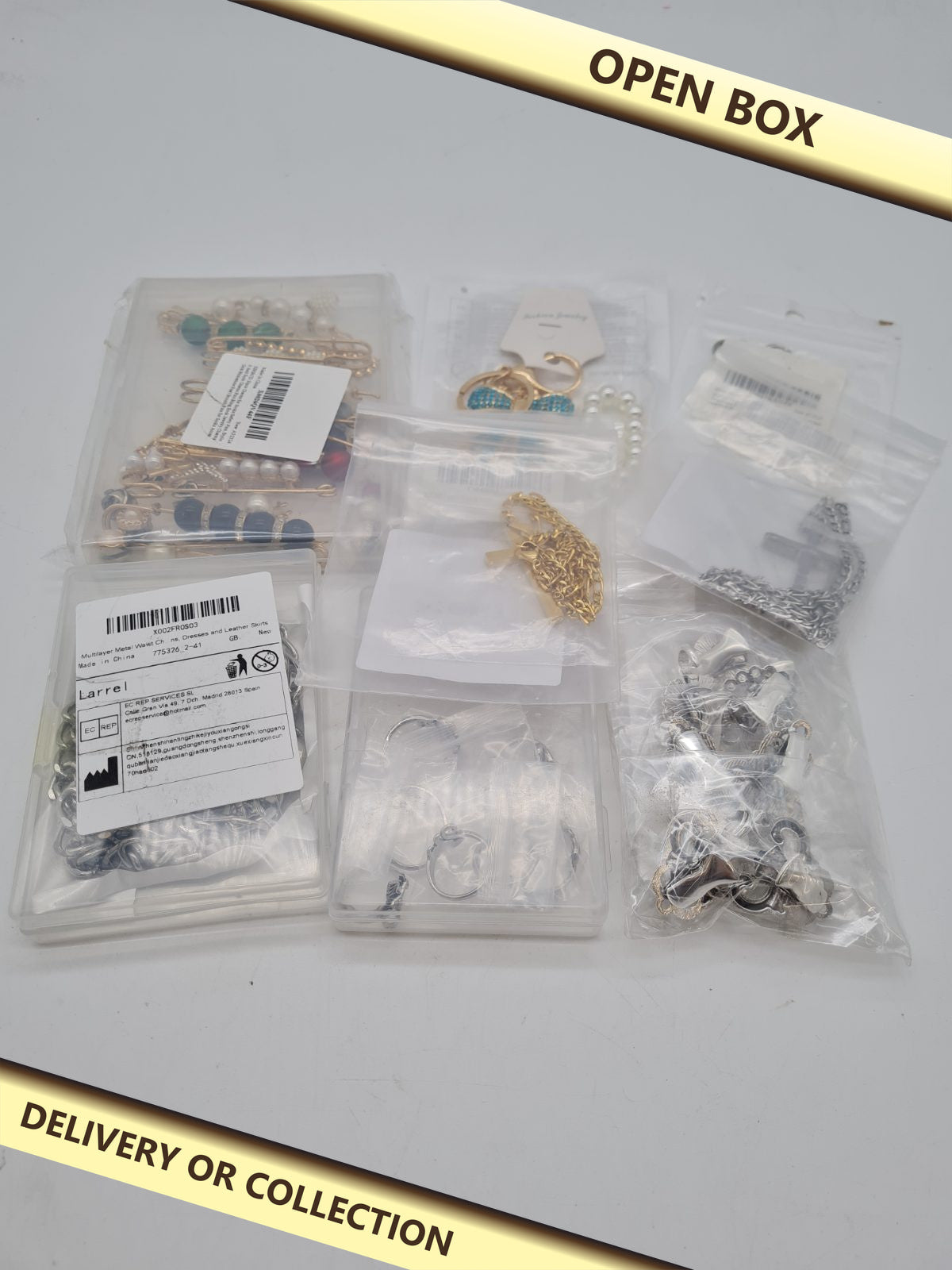 Jewellery bundle — photograph 1 — Open box; auction delivery information shown on image