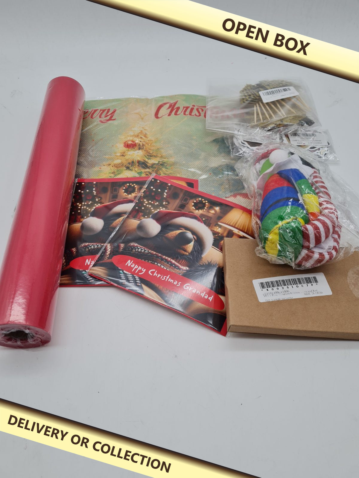 Mixed Christmas bundle — photograph 1 — Open box; auction delivery information shown on image