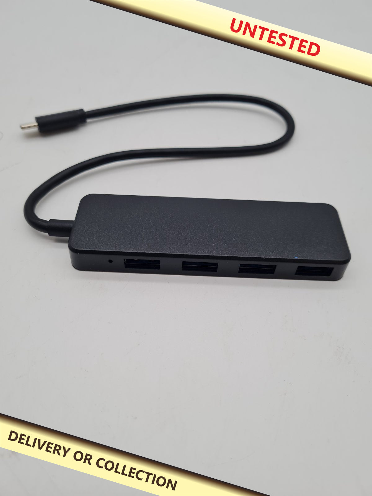 USB-C 3.0 4-Port USB Hub — photograph 1 — Untested; auction delivery information shown on image