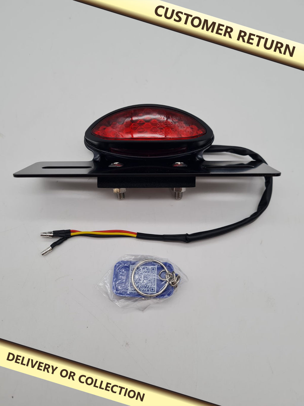 Motorcycle/Scooter LED Tail Light with Number Plate Bracket â€” photograph 1 — Customer return; auction delivery information shown on image