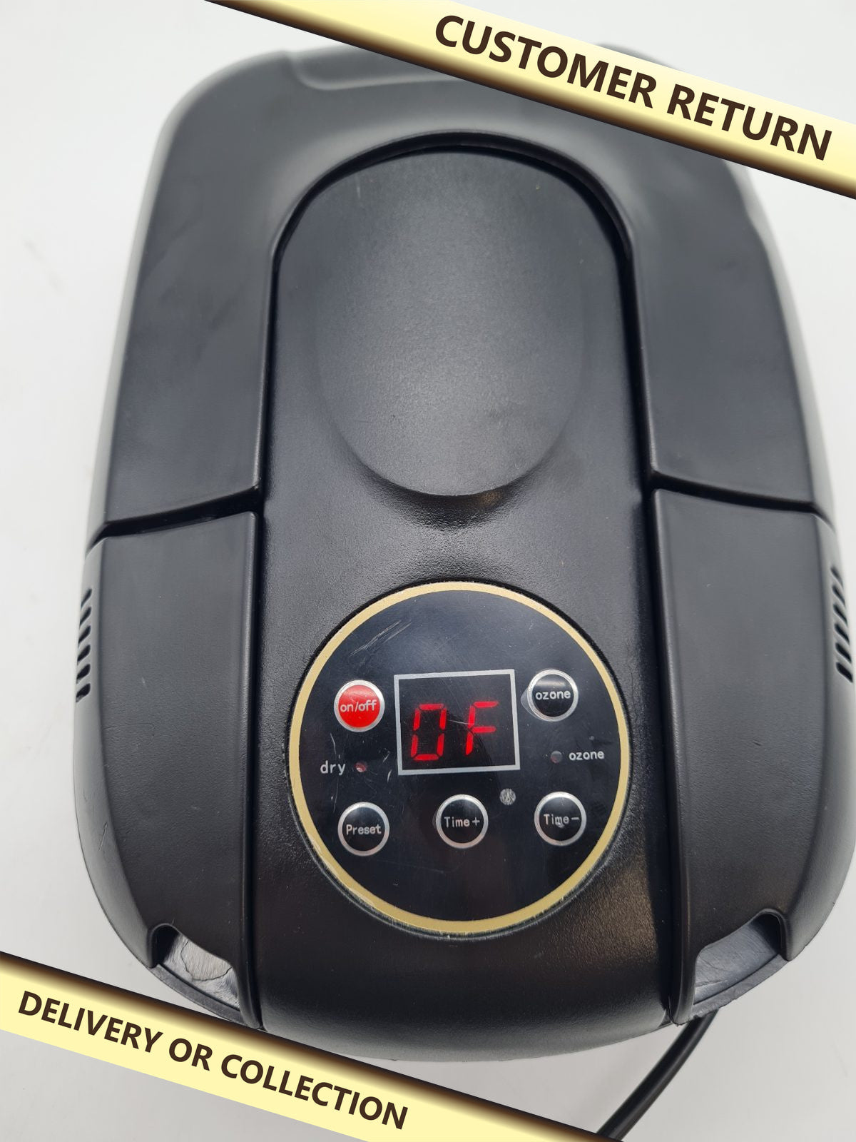 Electric Shoe Dryer — photograph 1 — Customer return; auction delivery information shown on image