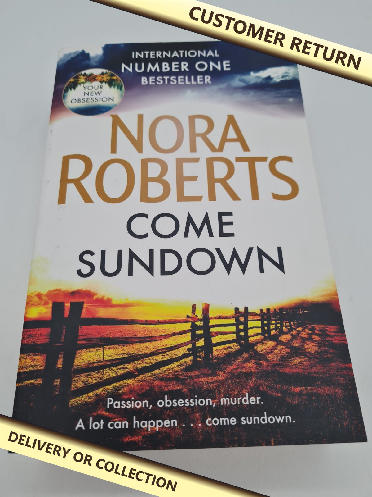 Paperback Book – Come Sundown by Nora Roberts — photograph 1 — Customer return; auction delivery information shown on image