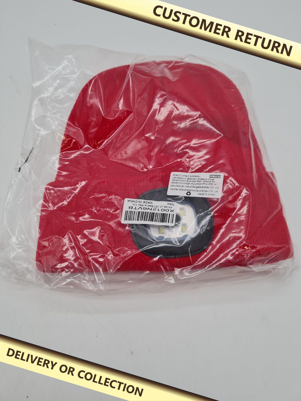 LED Beanie Hat - red — photograph 1 — Customer return; auction delivery information shown on image