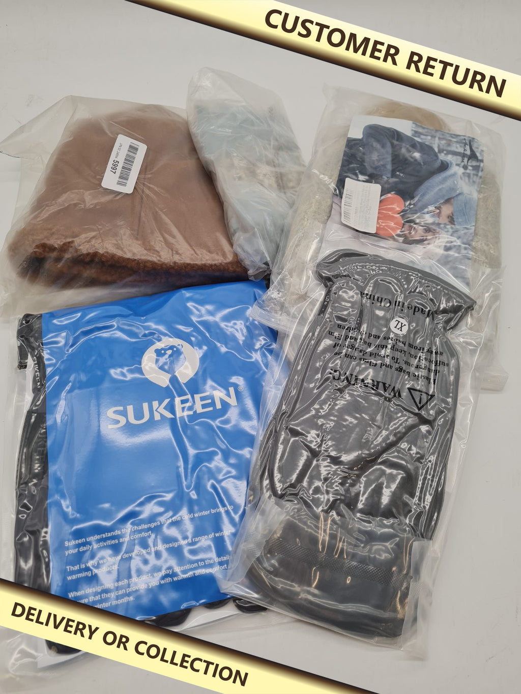 Mixed winter bundle — photograph 1 — Customer return; auction delivery information shown on image