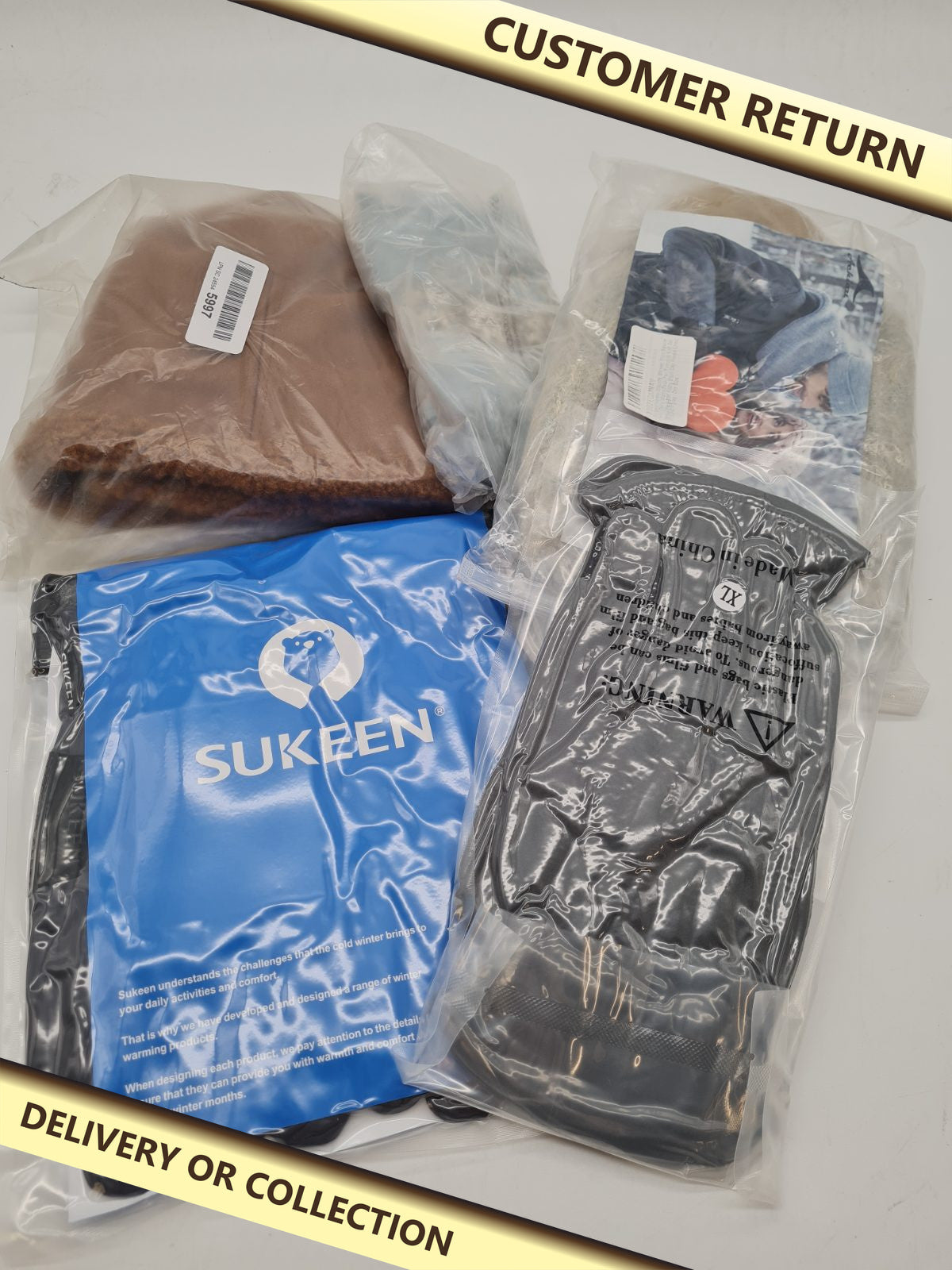 Mixed winter bundle — photograph 1 — Customer return; auction delivery information shown on image