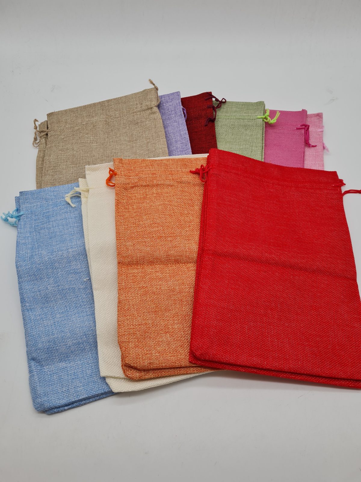 Assorted Jute-Style Drawstring Gift Bags — photograph 1