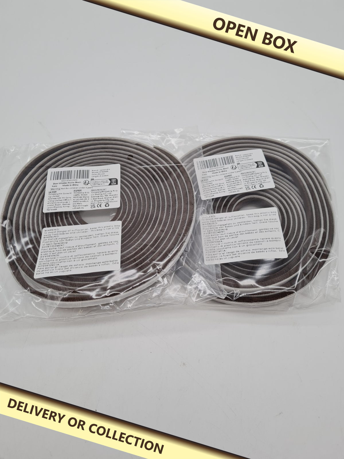Door and window frame brush seal RFTZ595 2 pack â€” photograph 1 — Open box; auction delivery information shown on image