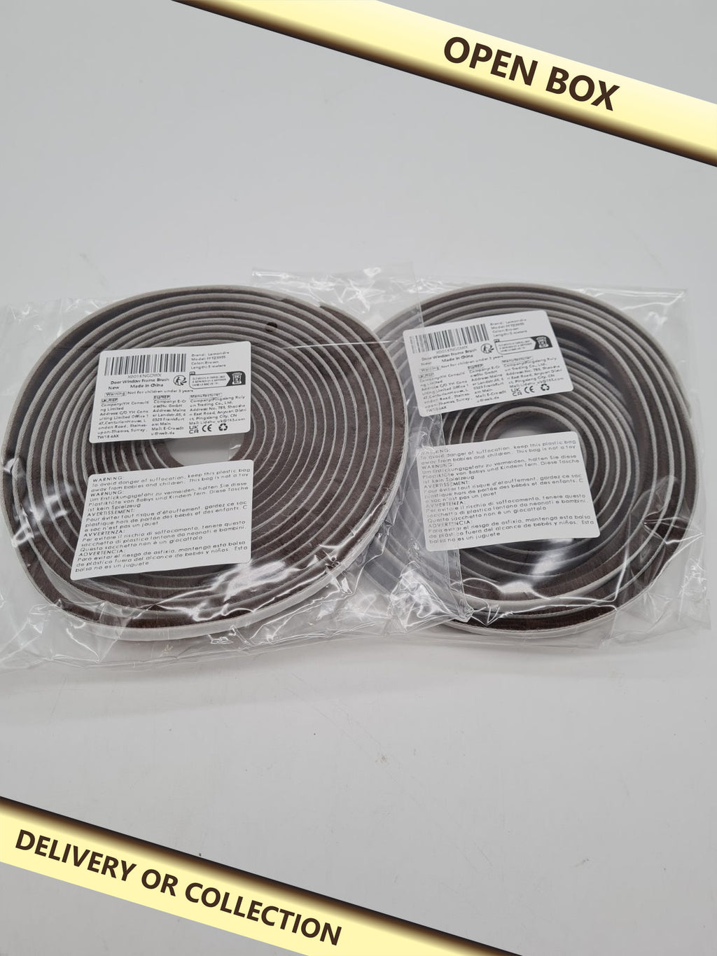 Door and window frame brush seal RFTZ595 2 pack — photograph 1 — Open box; auction delivery information shown on image