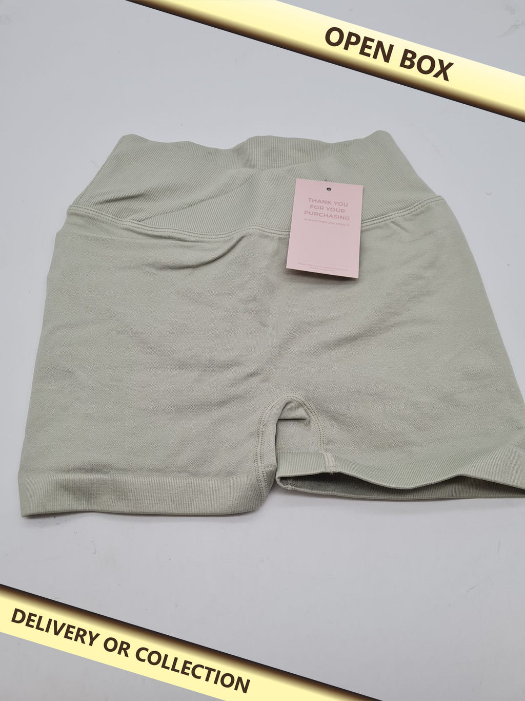 Women's High-Waisted Butt-Lifting Shaping Shorts size S — photograph 1 — Open box; auction delivery information shown on image