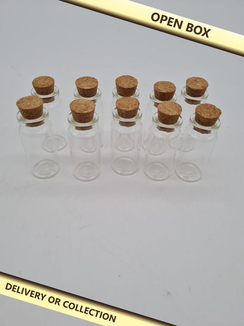 10 Small Glass Vials with Cork Stoppers — photograph 1 — Open box; auction delivery information shown on image