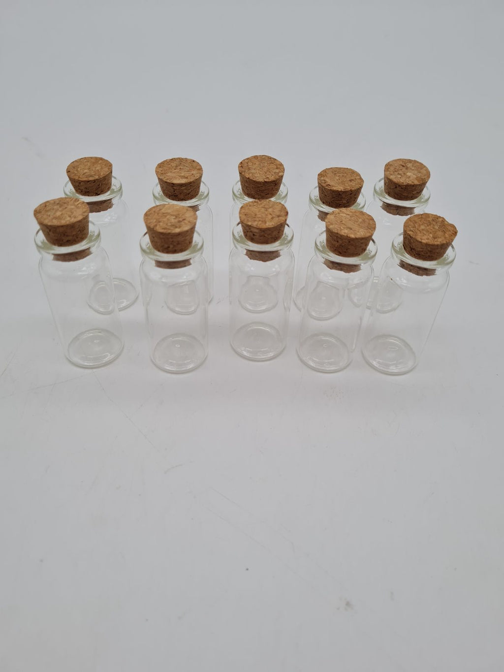 10 Small Glass Vials with Cork Stoppers — photograph 1