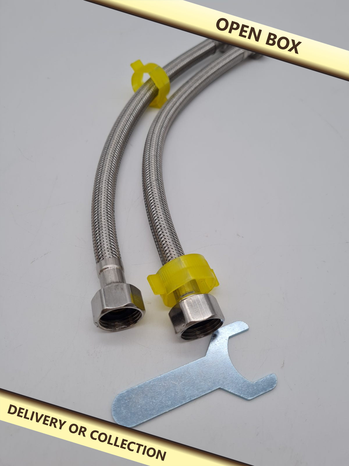 Pair of 30cm Braided Flexible Tap Connector Hoses â€” photograph 1 — Open box; auction delivery information shown on image